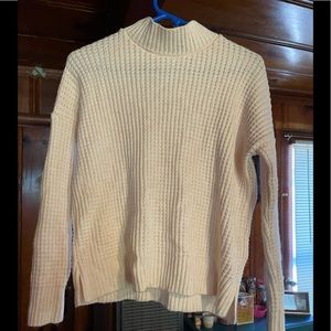 Off white mid turtle neck sweater.